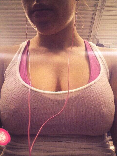 close up of MFC Tayler’s nipples poking through her workout top at the gym