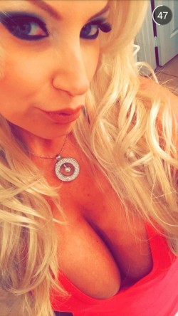 busty blonde Brittany Andrews shows us her cleavage